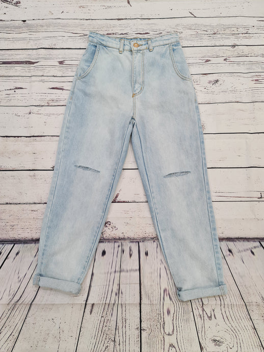 TENSIONE IN Jeans tagli chiaro